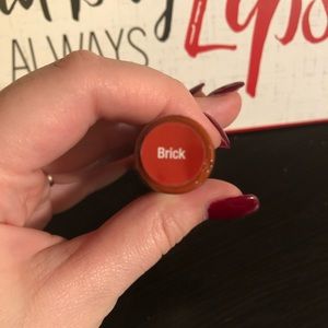 Brick colored lipsense